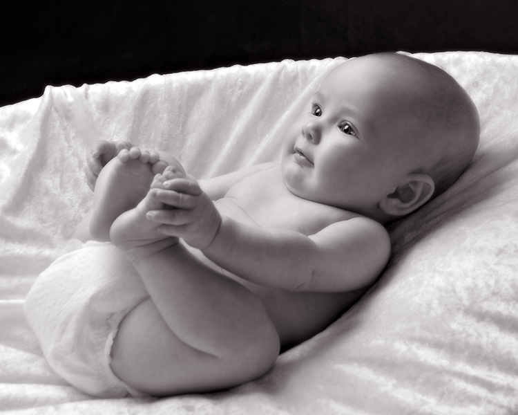 Baby Laying On His Back Holding Feet Cleary Creative Photography