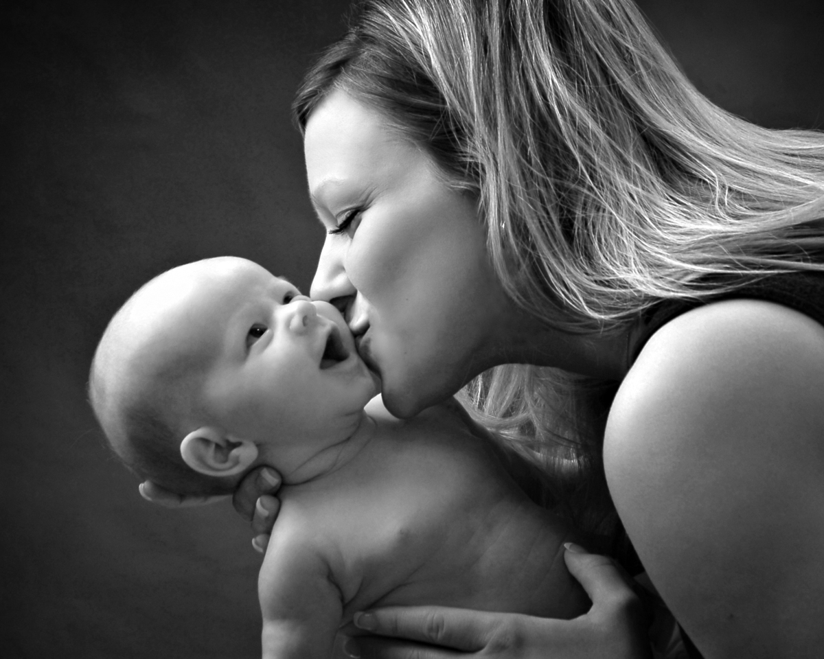 Mommy kissing laughing baby by Cleary Creative Photography in Dayton Ohio