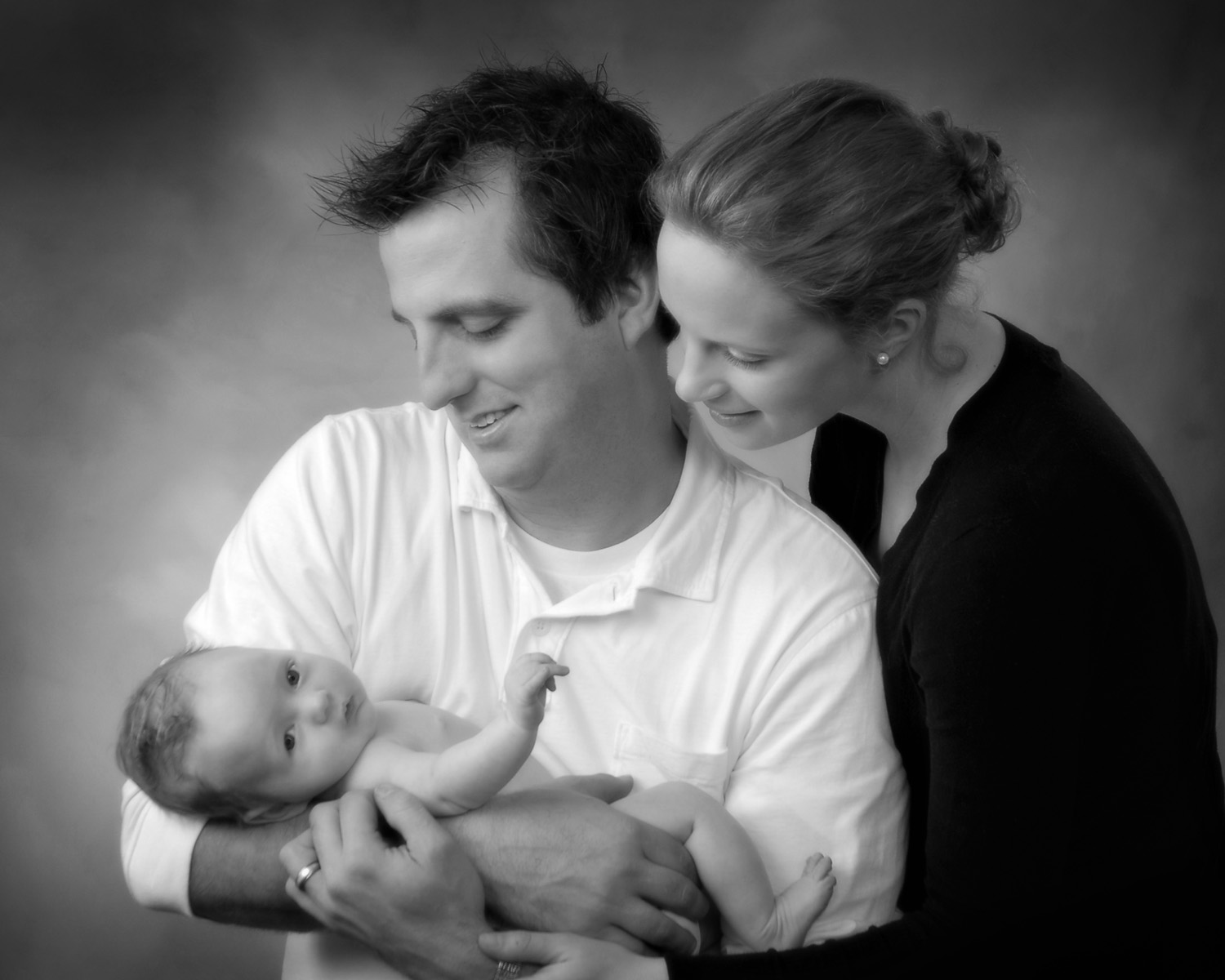 black and white portrait of Mom holding onto baby by Cleary Creative Photography in Dayton Ohio