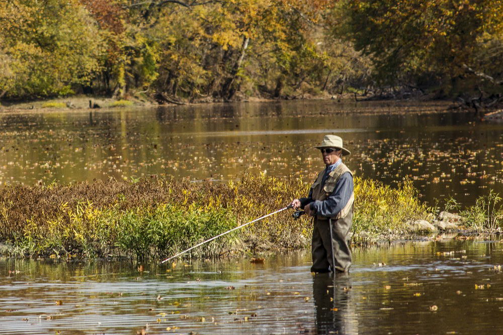 Fly fisherman on Miami River Tipp City Ohioby Dan Cleary of Cleary Creative Photography in Dayton Ohio