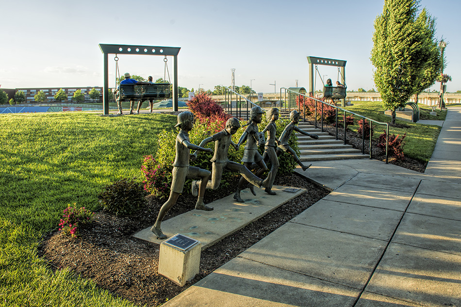 Statue of children RiverScape Metro Park Dayton Ohio by Dan Cleary of Cleary Creative Photogrphy