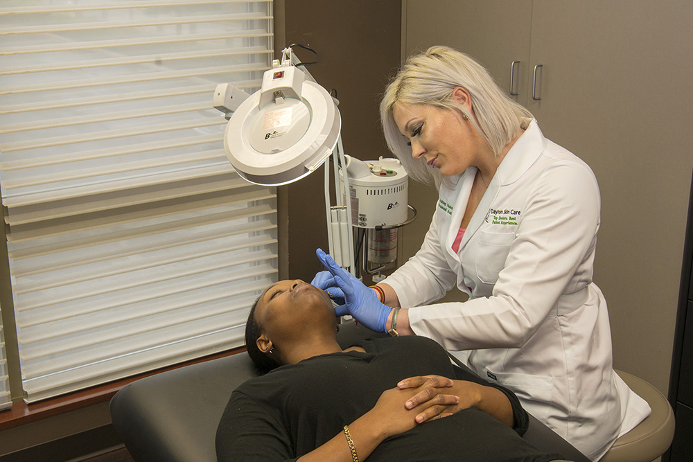 Photograph of clinician with patient by Dan Cleary of Cleary Creative Photogrtaphy in Dayton Ohio