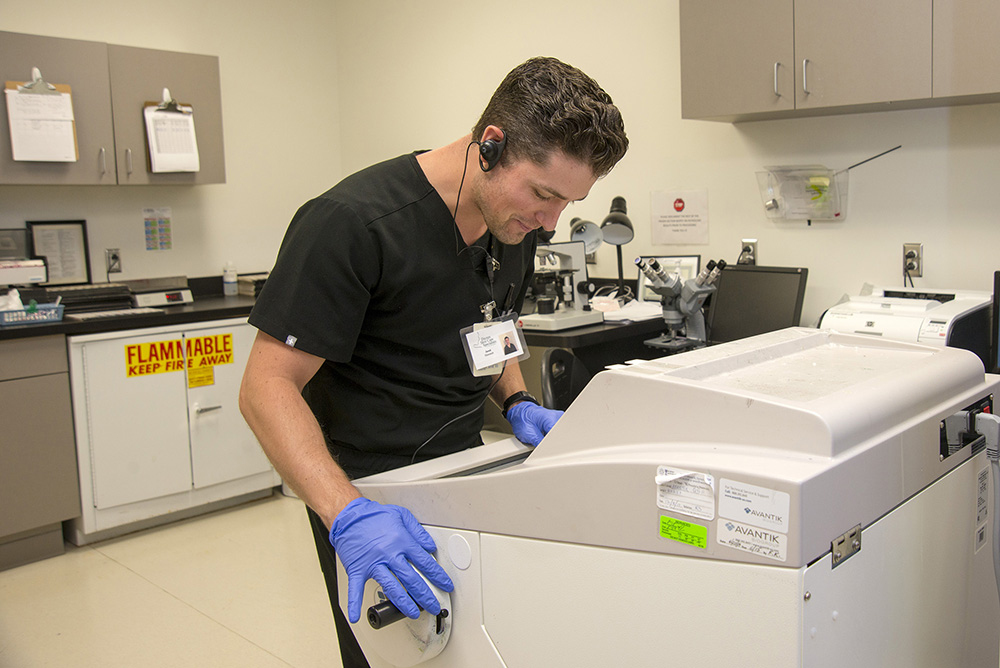 Photograph of lab tech by Dan Cleary of Cleary Creative Photogrtaphy in Dayton Ohio