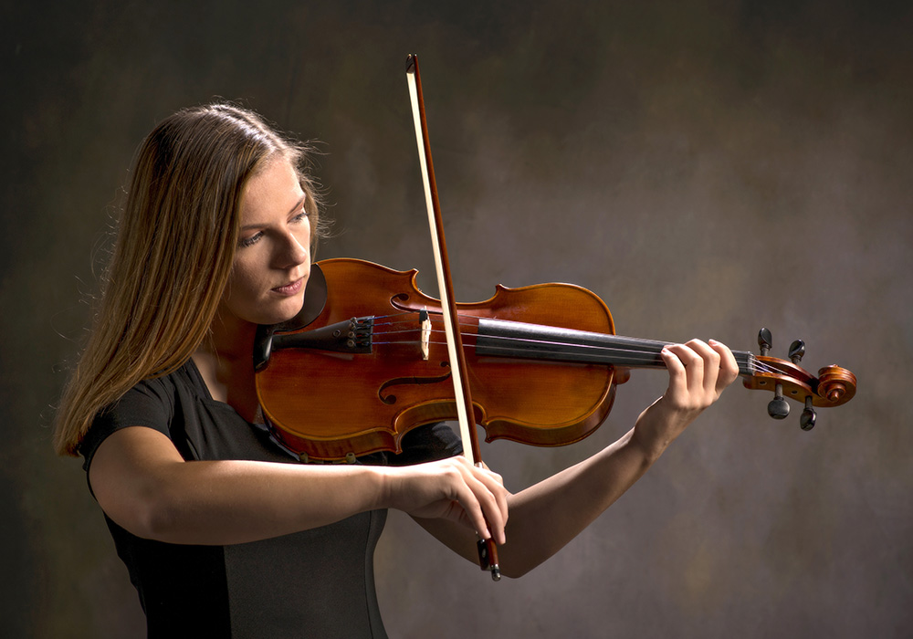 high senior girl playing the violin by Dan Cleary of Cleary Creative Photography in Dayton Ohio