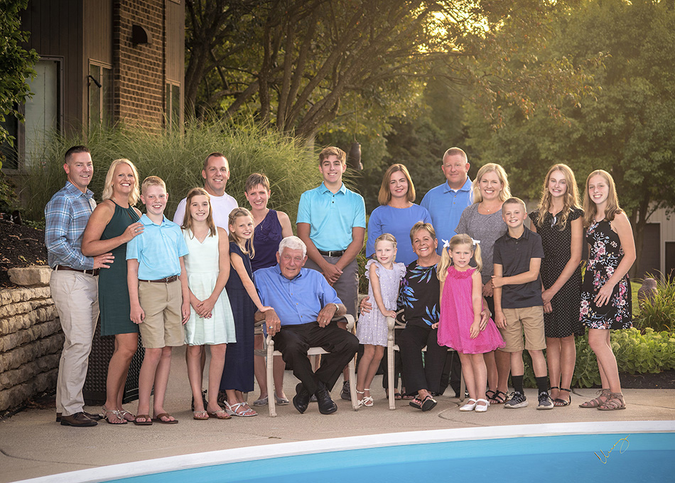 family portrait in backyard by pool by Dan Cleary of Cleary Creative Photography in Dayton Ohio