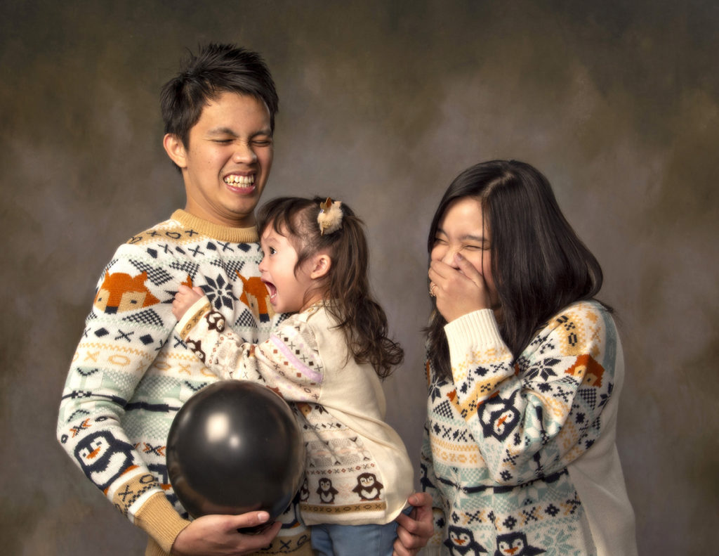 Family portrait with screaming two year old girl by Dan Cleary of Cleary Creative Photography in Dayton Ohio
