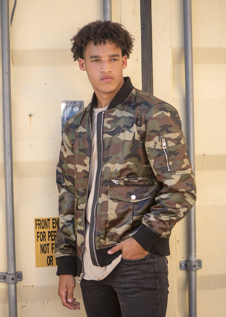 high school senior boy with industrial background by Dan Cleary Dayton Ohio